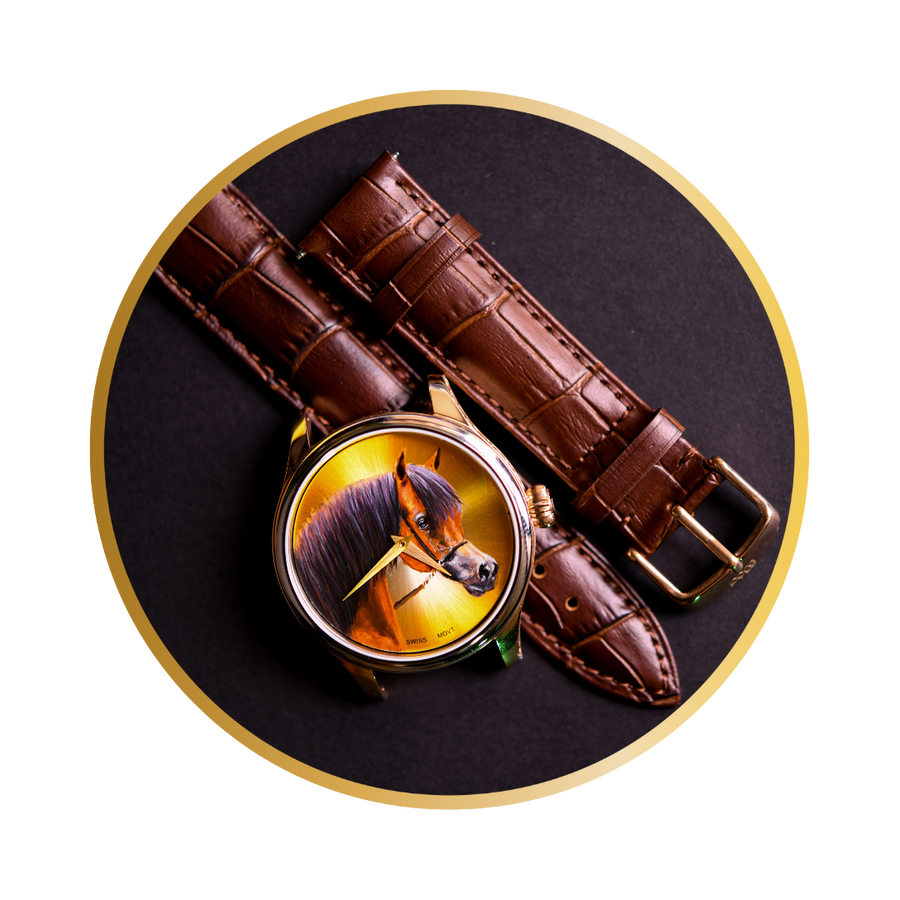 A luxurious B360 watch featuring a hand-painted depiction of a brown, golden, and black-haired Arabian horse on the dial. The elegant horse showcases its distinctive dished face, large wide-set eyes, and an arched tail, embodying grace and athleticism. This exquisite timepiece captures the timeless allure of the Arabian breed, symbolizing the harmonious bond between humans and horses.