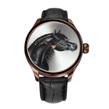  A luxurious B360 wristwatch with a hand-painted depiction of 'Al Adham,' a full black Arabian horse, on the dial. The watch embodies elegance and strength, celebrating the harmonious bond between nature and artistry."
