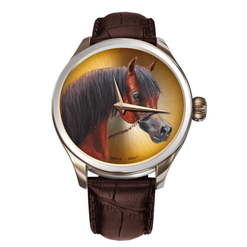 A luxurious B360 watch featuring a hand-painted depiction of a brown, golden, and black-haired Arabian horse on the dial. The elegant horse showcases its distinctive dished face, large wide-set eyes, and an arched tail, embodying grace and athleticism. This exquisite timepiece captures the timeless allure of the Arabian breed, symbolizing the harmonious bond between humans and horses.